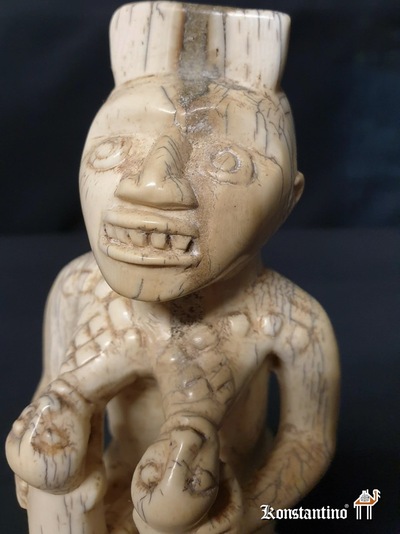 1009-Afri  Figura de hueso africana antigua 16x7 cms