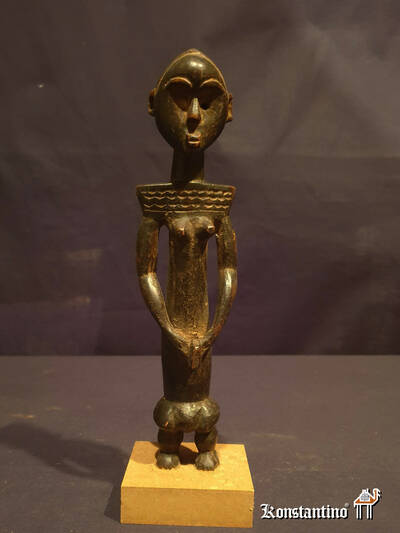 1263-Afri  Figura femenina africana en madera 24x6 cms
