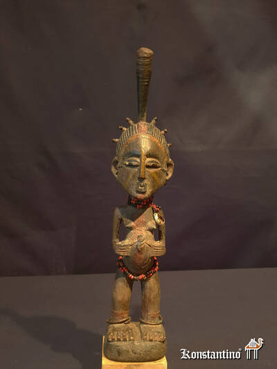 718-Afri  Figura antigua africana en madera  33x7 cms 