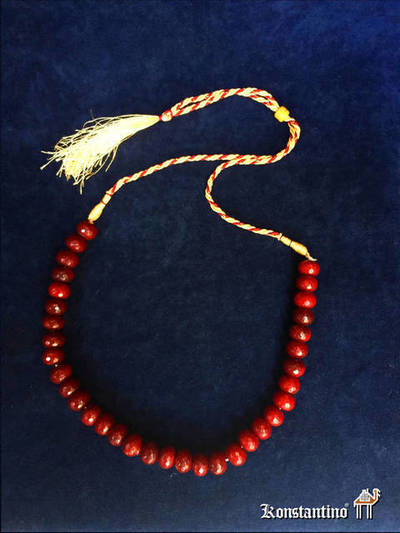 30970-H. Nom. Collar de piedras de Rubies tallados y cordón. VENDIDO
