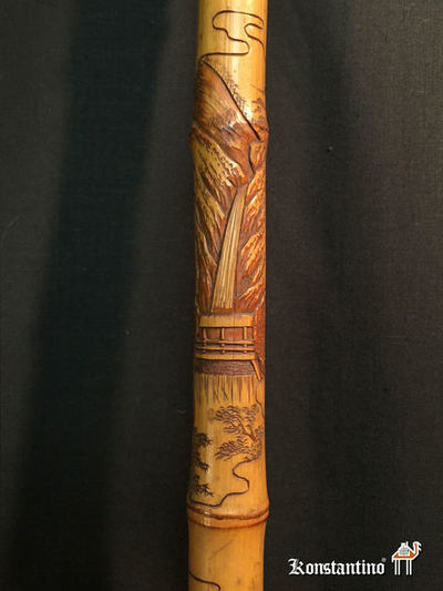 1191-C    91 cms    “Baston  “ en madera de Bambú con grabados, fin S. XIX principios del S. XX. China o japón