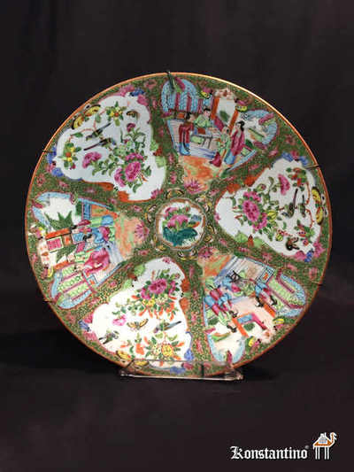  1179-C     34 cms             Plato policromado de porcelana china de 1ºs del XX. Está roto y arreglado