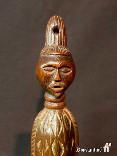 1285-Afri  Figura de la etnia Kuyu  21x4cms